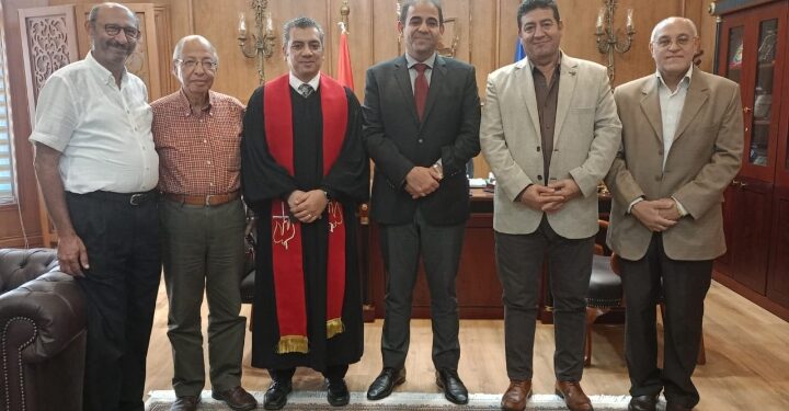 رئيس جامعة بورسعيد يستقبل راعى الكنيسة الانجيلية ببورسعيد